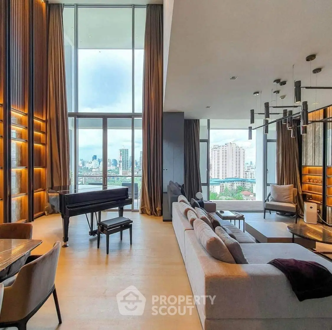 Luxurious high-rise living room with grand piano and stunning city view