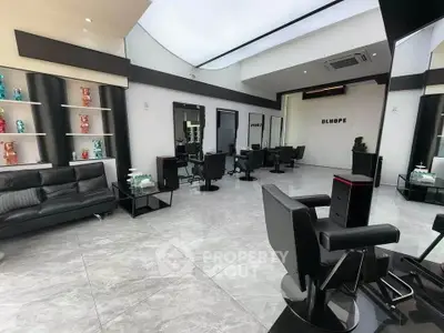 Modern salon interior with sleek black furniture and stylish decor