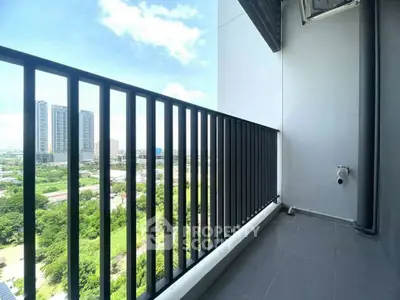 Modern balcony with stunning cityscape view and sleek railing design.