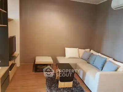 Cozy living room with modern furniture and air conditioning