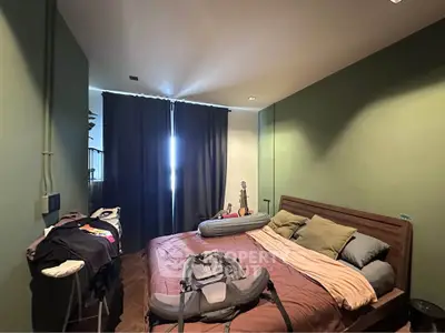 Cozy bedroom with modern decor and natural light