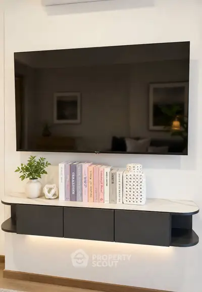 Modern living room with sleek TV unit and stylish decor