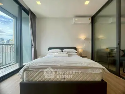 Modern bedroom with city view and balcony access in luxury apartment