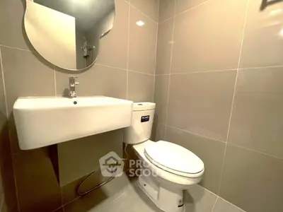 Modern bathroom with sleek fixtures and elegant tile design