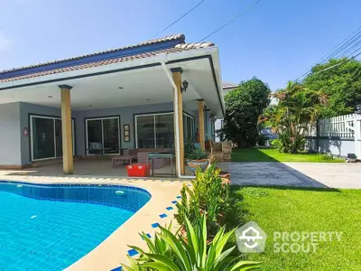 Spacious modern home with pool and lush garden, perfect for family living and entertaining.