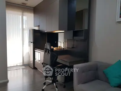Modern study area with sleek desk and comfortable chair in stylish apartment