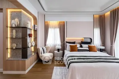 Luxurious modern bedroom with elegant decor and ambient lighting, featuring a cozy reading nook and stylish shelving.