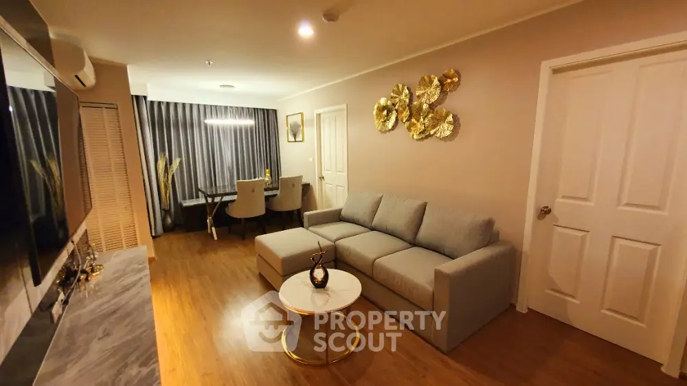 Modern living room with elegant decor and cozy seating area