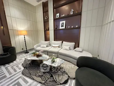 Luxurious modern living room with elegant decor and stylish furniture, perfect for sophisticated living.