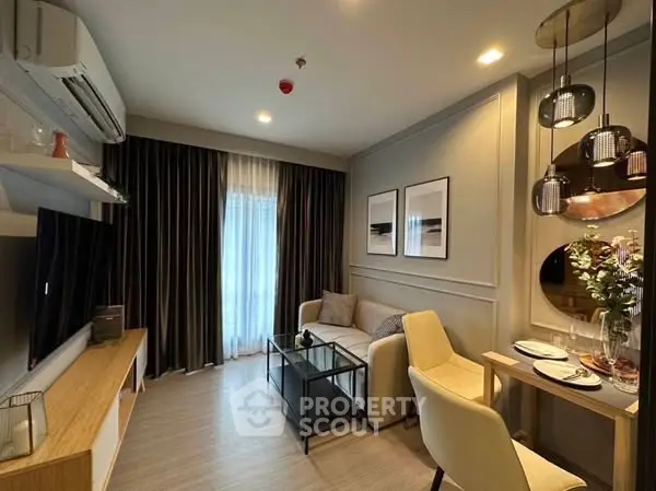 Modern living room with elegant decor and cozy dining area