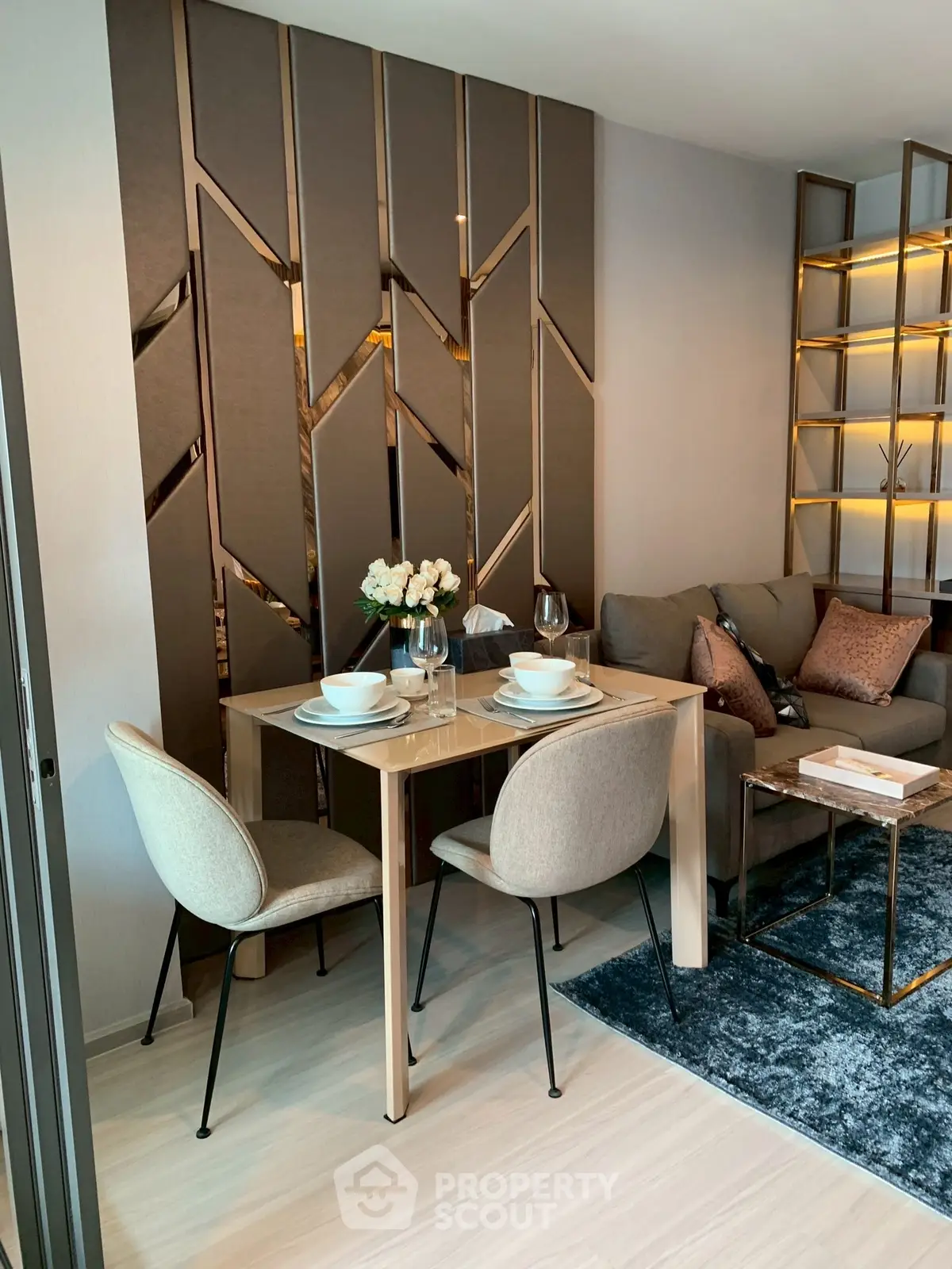 Modern living room with stylish dining area and elegant decor