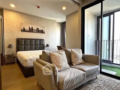Modern bedroom with balcony access and stylish decor