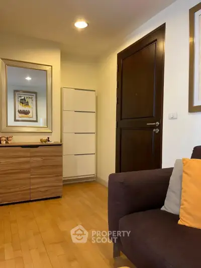 Cozy living room with wooden flooring and modern decor