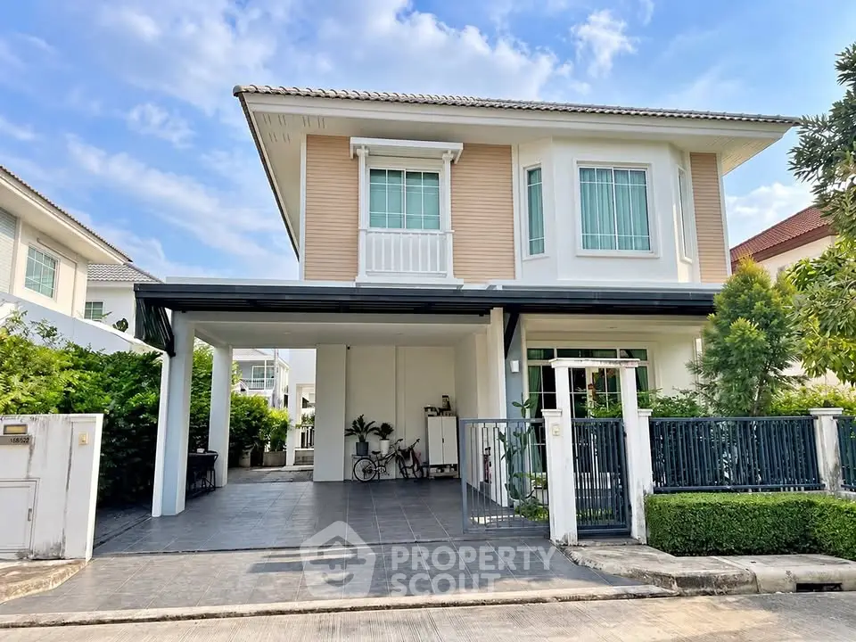 Charming two-story house with modern design and spacious driveway in a serene neighborhood.