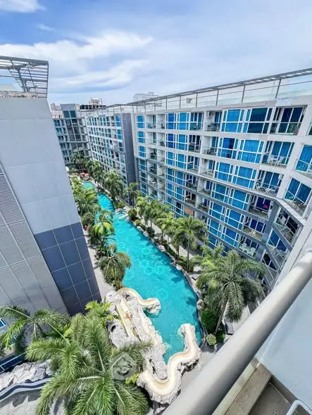 Luxurious condominium with stunning pool view and modern architecture
