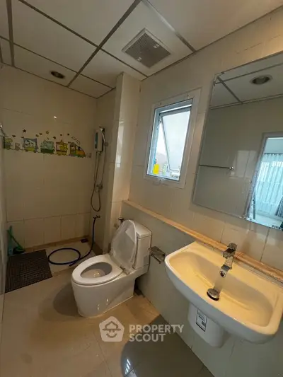 Modern bathroom with sleek fixtures and natural light