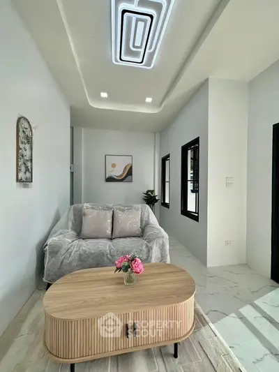 Modern living room with stylish decor and natural light