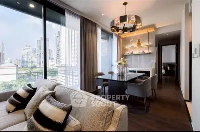 Luxurious modern living room with city view, elegant decor, and spacious dining area in high-rise apartment.