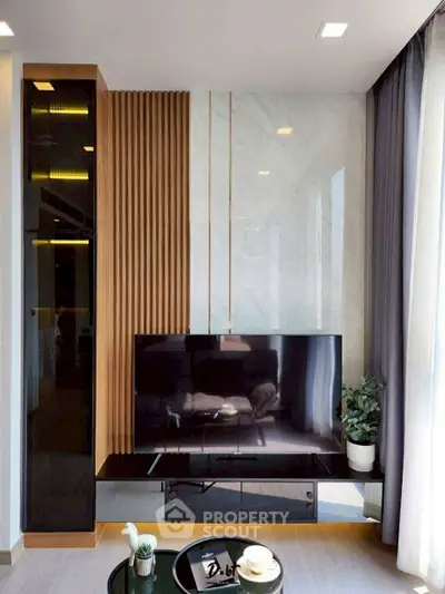 Modern living room with sleek TV setup and stylish decor