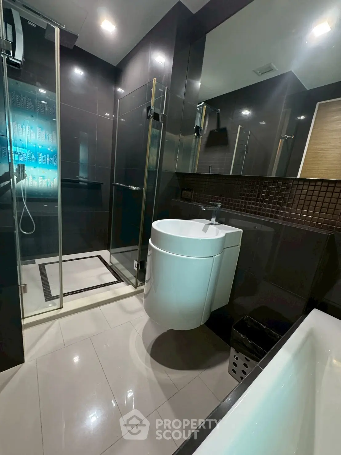 Modern bathroom with sleek design and glass shower enclosure