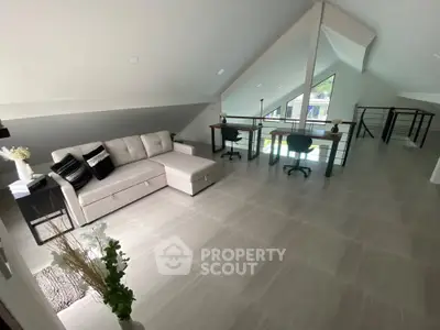 Spacious loft with modern furniture and ample natural light