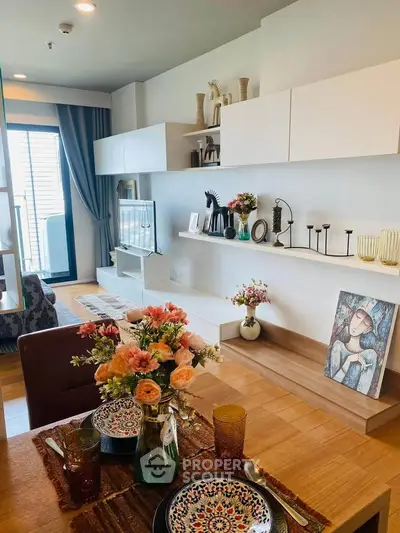 Stylish modern living room with elegant decor and balcony view