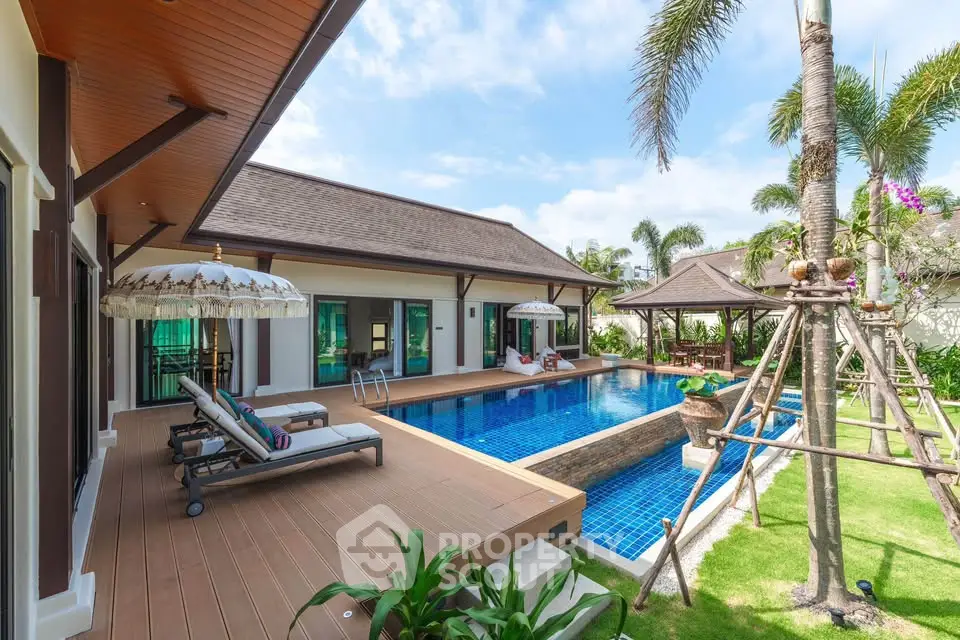 Luxurious tropical villa with private pool and lush garden, perfect for serene living.