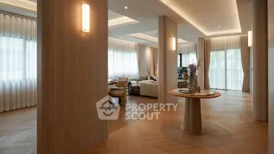 Luxurious living room with elegant lighting and spacious seating area