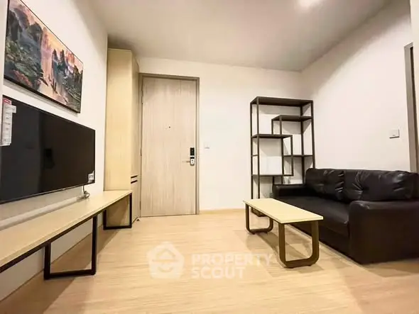 Modern living room with sleek furniture and stylish decor, perfect for urban living.
