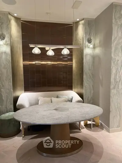 Elegant dining nook with modern lighting and luxurious decor