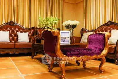 Luxurious living room with elegant furniture and rich decor