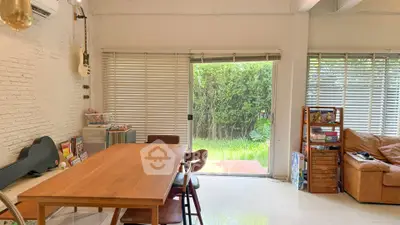 Spacious living room with garden view and modern decor