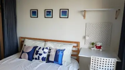 Cozy bedroom with modern decor and stylish wall art