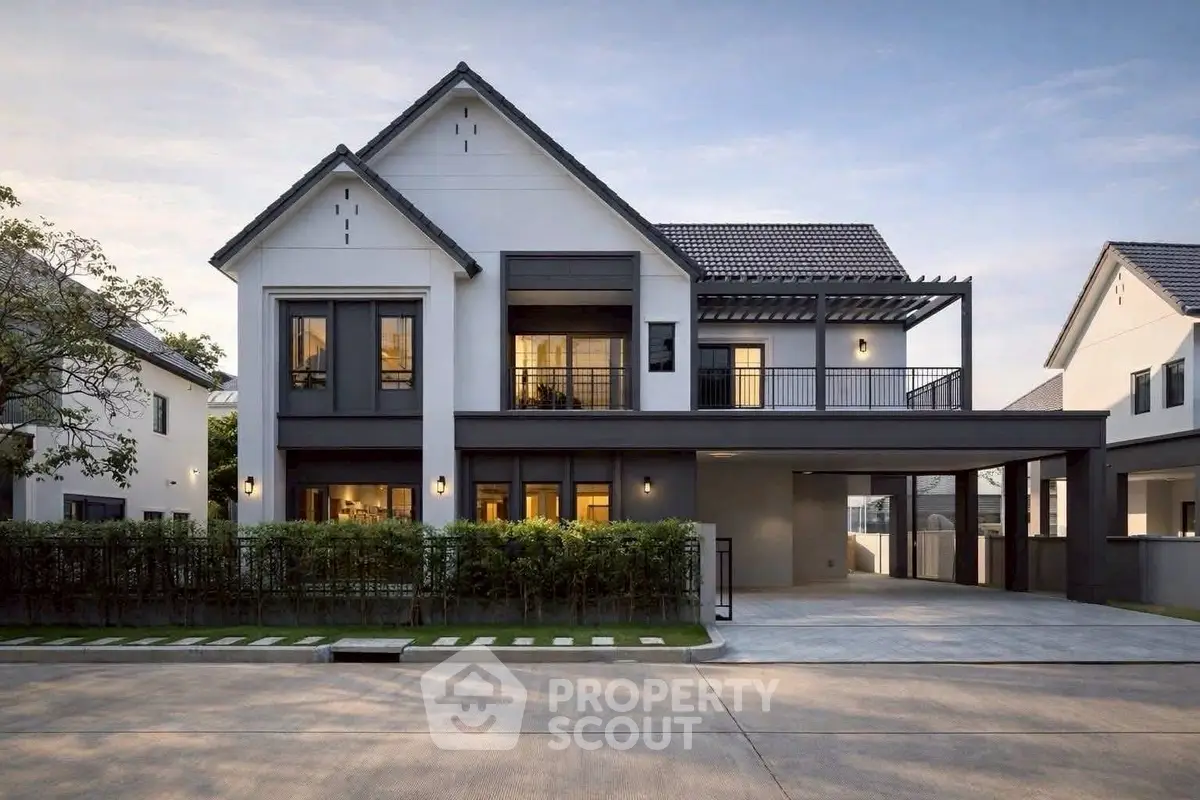 Stunning modern two-story house with sleek design and spacious driveway in a serene neighborhood.