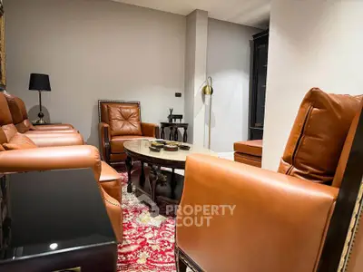 Luxurious living room with leather seating and elegant decor