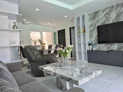 Luxurious modern living room with marble accents and elegant decor