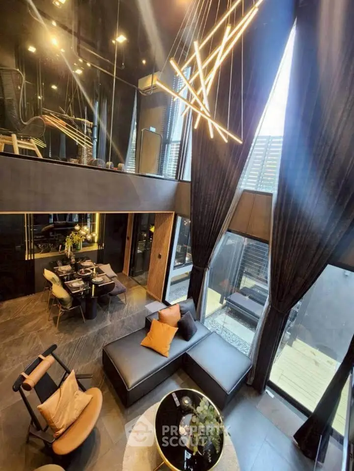 Luxurious modern living room with high ceilings and stylish lighting