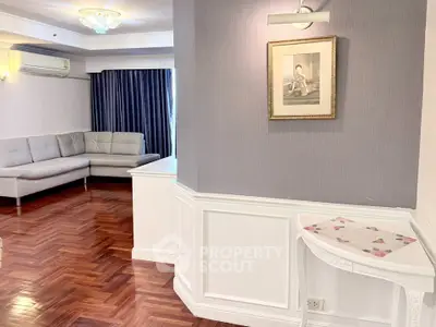 Elegant living room with parquet flooring and stylish decor