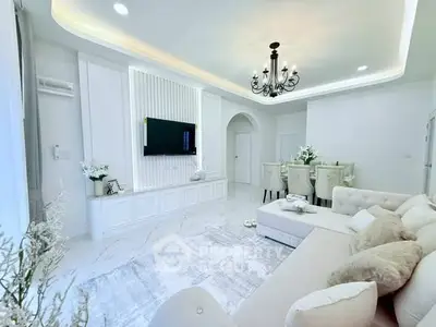 Elegant living room with chandelier and modern decor