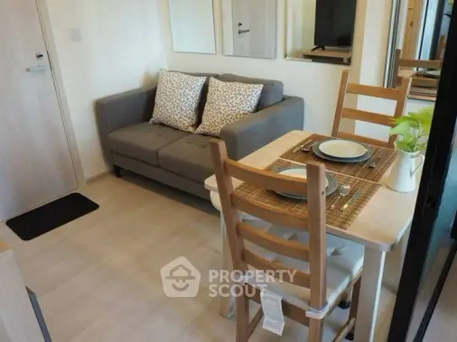 Cozy living room with dining area in modern apartment