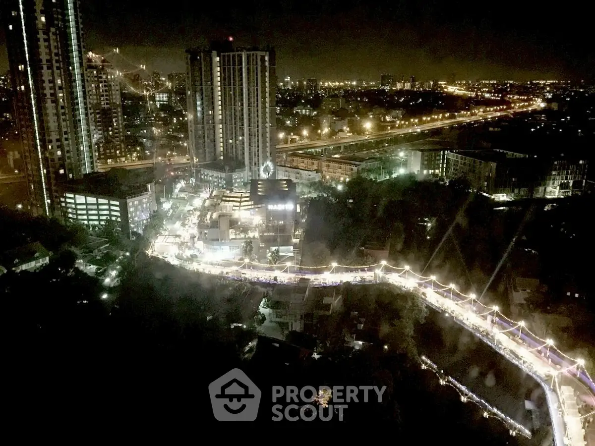 Stunning cityscape night view with illuminated streets and high-rise buildings