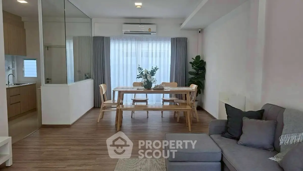 Modern living room with dining area and stylish decor