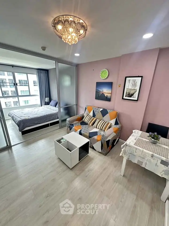 Modern apartment interior with stylish living room and cozy bedroom view