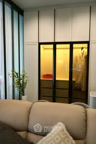 Luxurious living room with modern walk-in closet and elegant decor