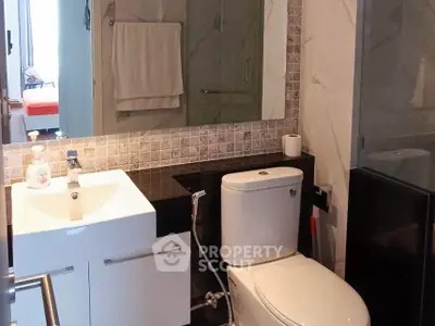 Modern bathroom with sleek fixtures and elegant tile design