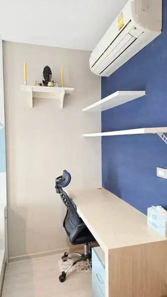 Modern study room with sleek desk, ergonomic chair, and air conditioning.