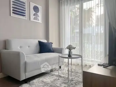 Modern living room with stylish decor and natural light