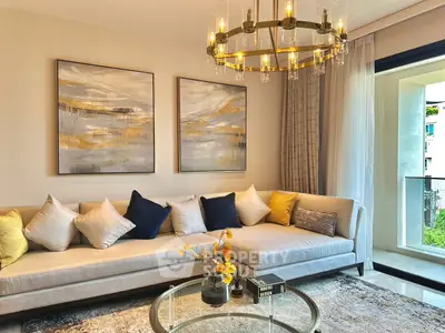 Luxurious living room with elegant chandelier and modern decor