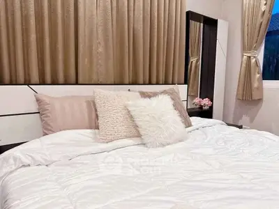 Luxurious bedroom with plush bedding and elegant decor, perfect for relaxation and comfort.