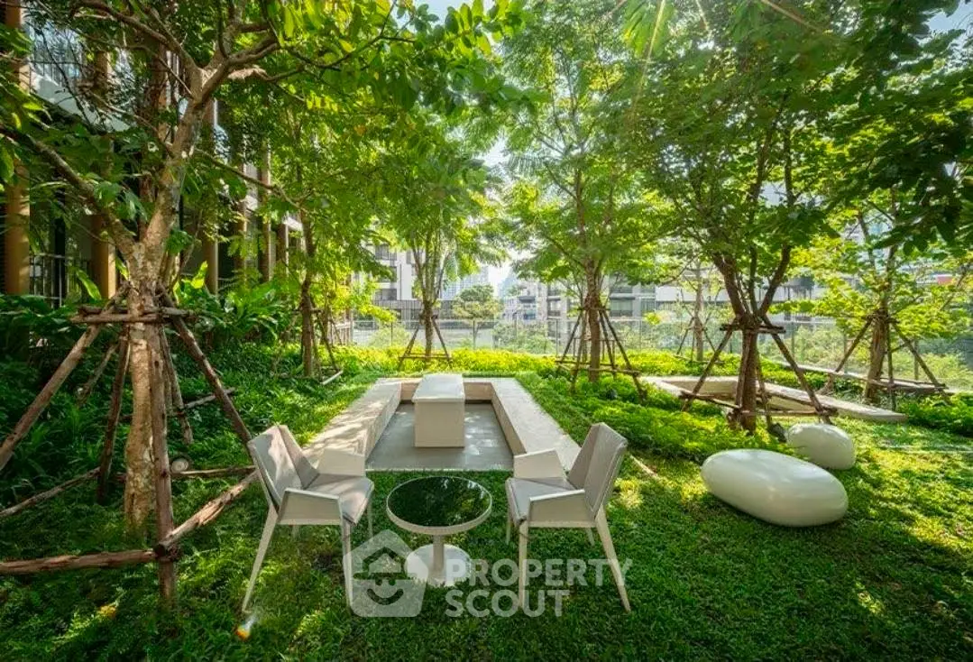 Lush garden with modern seating in a serene residential setting.